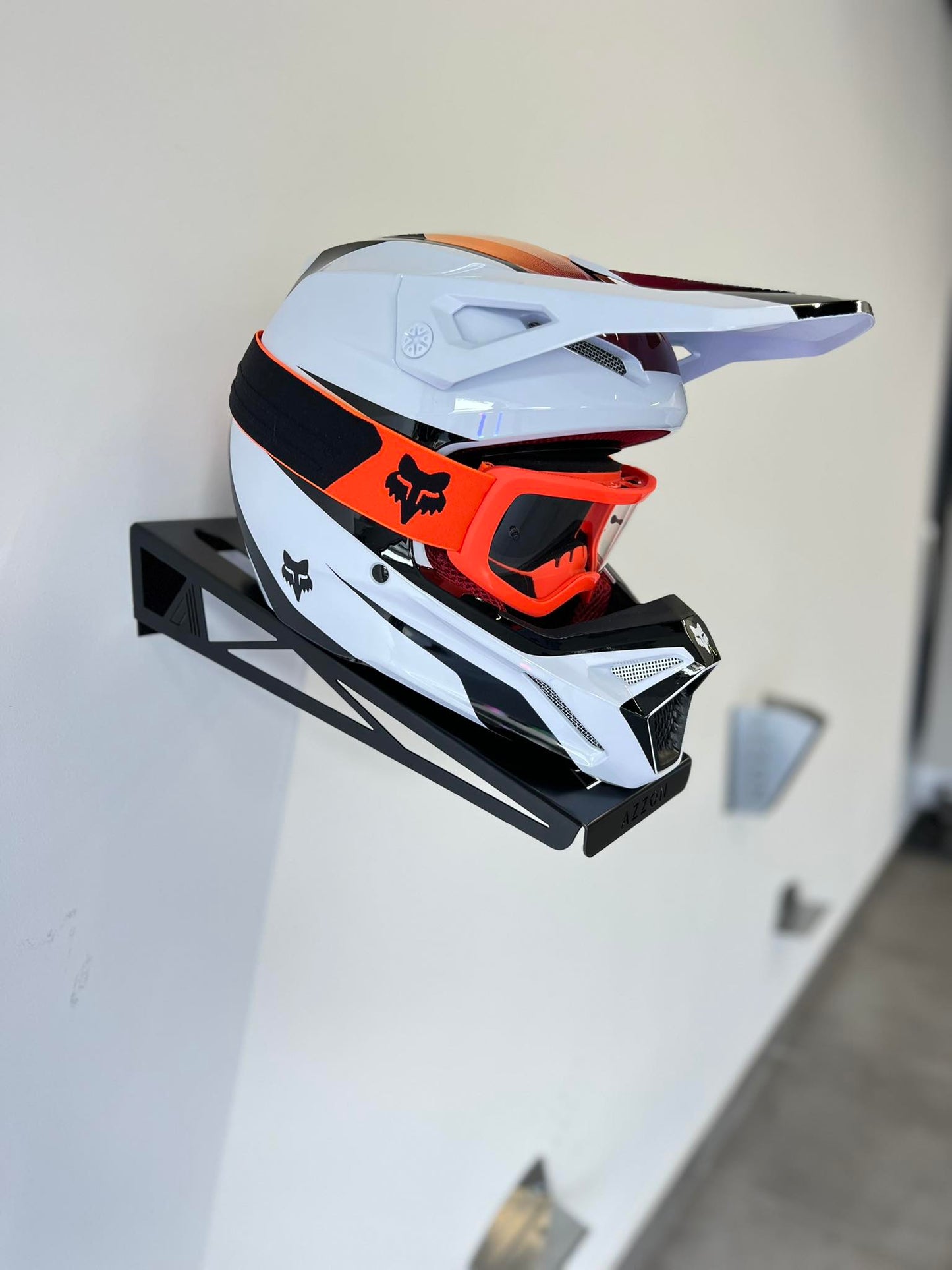 Motorcycle helmet rack